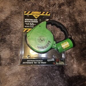 Green Retractable Dog Leash with Bag Dispenser I have 1 Orange Color Available.